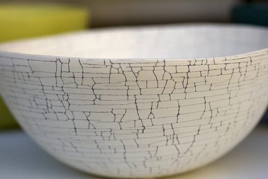 White ceramic cup decorated with crackle