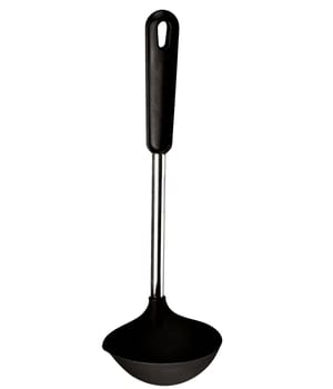 Big black plastic kitchen spoon isolated on white