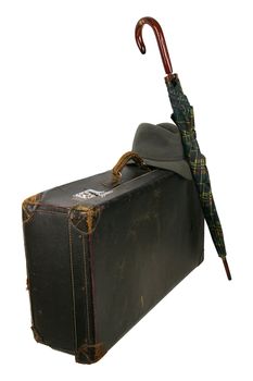 Old brown suitcase on a light background