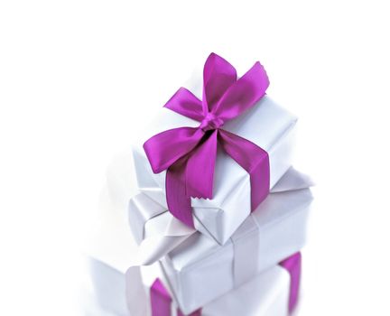 White gift with violet bow