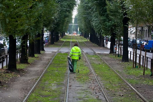 Garbage man on tracks, Milan