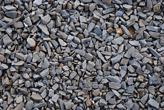 Rail road track ballast stone gravel close-up as background