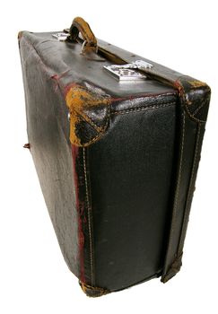 Old brown suitcase on a light background.