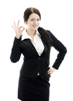 Portrait of business woman gesturing okay sign. Isolated on white.