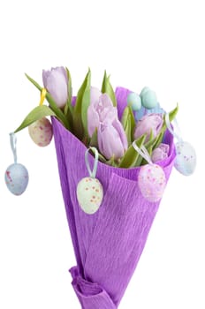 Bouquet from easter aggs and tulips isolated on white