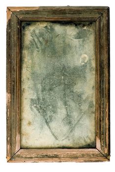 Ancient dusty mirror in an antiquarian wooden framework