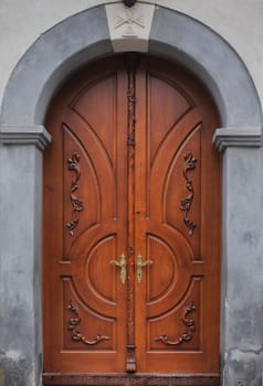 Wooden doors in old building in  Lviv (Ukraine)