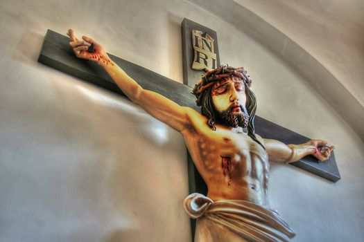 Holy cross with crucified Jesus Christ