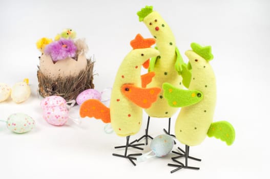 Easter chicken family on the light background