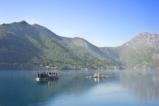 View on Sv.Djordje (left) and Gospa od Skrpjela ( right) alo known as  Church "Our Lady of the rocks" in the morning. Perast, Montenegro