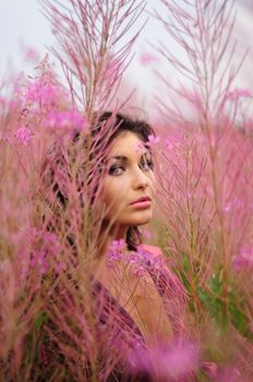 woman in violet flowers