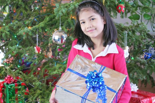 Child with Christmas gifts