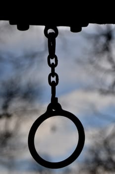 Jungle gym playground ring looking like surreal eyes and a mouth