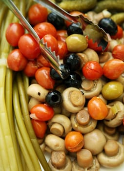 The olives, pickled tomatoes and mushrooms