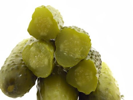 dill pickles on the white background 