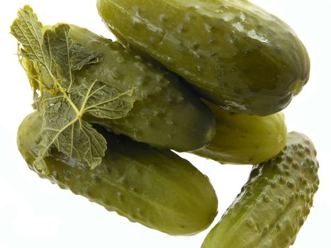 dill pickles on the white background 