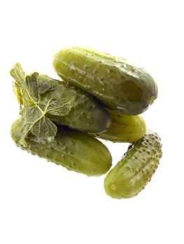 dill pickles on the white background 