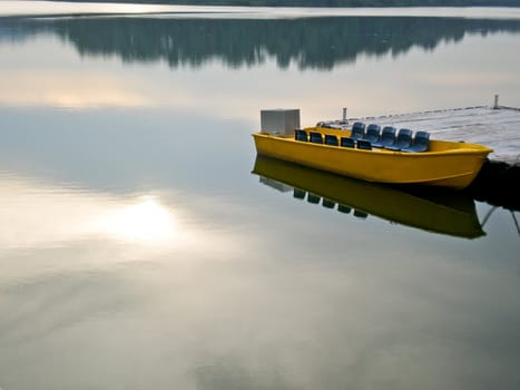 Empty boat on still water