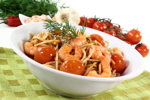 spaghetti with shrimps, tomatoes and dill