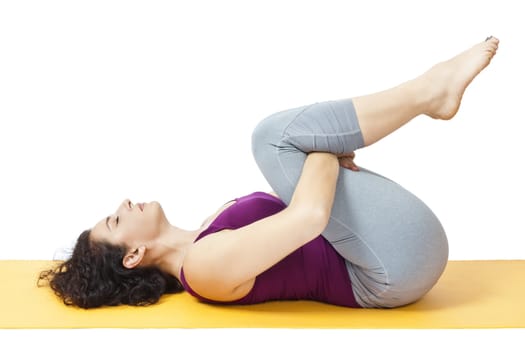 An image of a pretty woman doing yoga