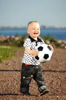  young smile boy play football