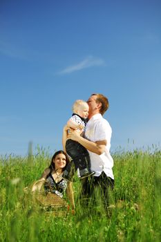  happy family on green field