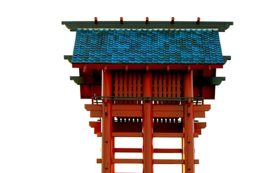 Red Japanese gate in downtown Los Angeles on white background