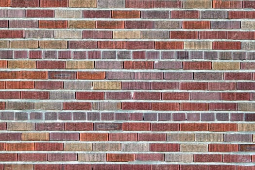 Vibrant multi color red brick wall pattern