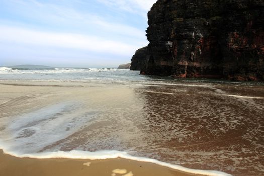 a view of the beach cliffs in ballybunion co kerry ireland