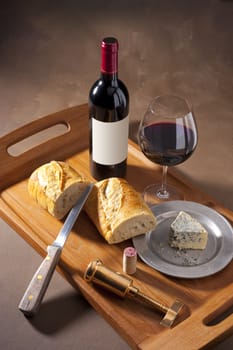 Wine, cheese and bread still life on dutch master canvas background
