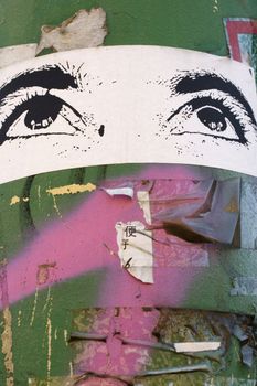 Photo of Eyes sticker, urban art in Milan
