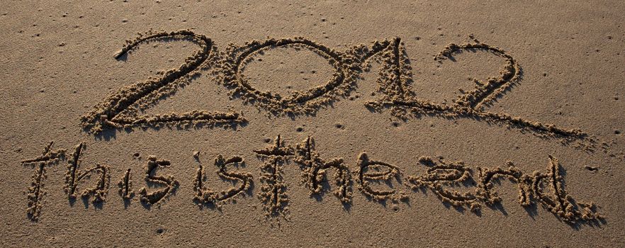 2012 this is the end written on the beach
