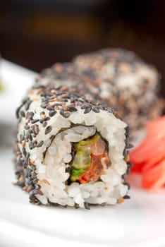 Closeup of Sushi rolls at plate with sesame