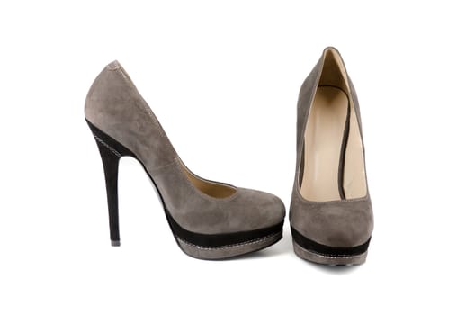 grey female shoes on a white background