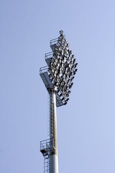 Stadium lights on sky background