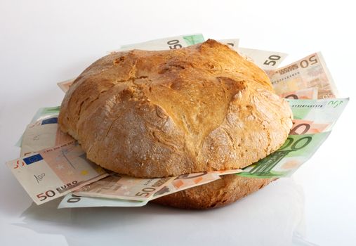 Bread with bills isolated on a white background