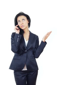 Businesswoman talking via cell phone on a white background