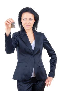 Businesswoman on a white background holding out house keys