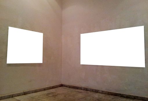 Empty frames on gallery wall