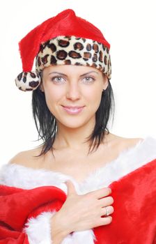 Serene pretty smiling woman in Santa Claus costume