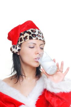 Woman in Santa Claus costume drinking a fresh milk cocktail
