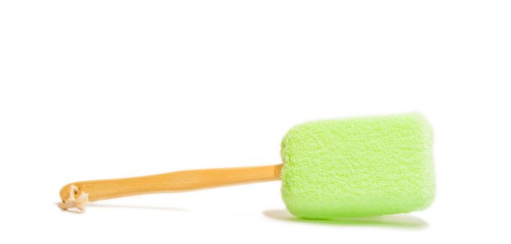 Sponge with the handle isolated on a white background