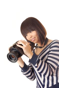 Young surprised lady looking into the photo camera