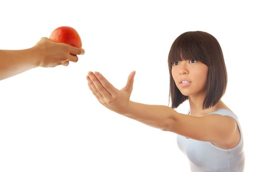 Hand giving the fresh apple to the young lady as a symbol of help