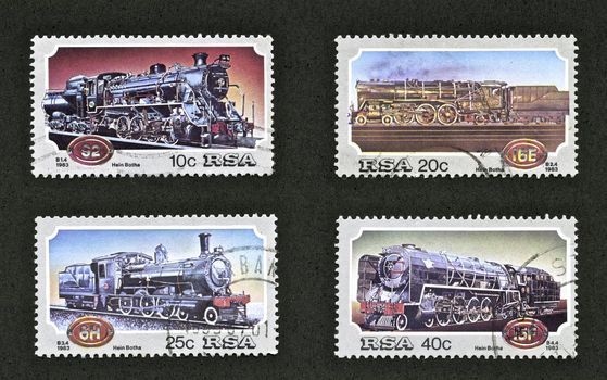 Train Stamps from South Africa in 1983

SOUTH AFRICA - CIRCA 1983: stamp printed by South Africa shows a collection locomotive designs circa 1983