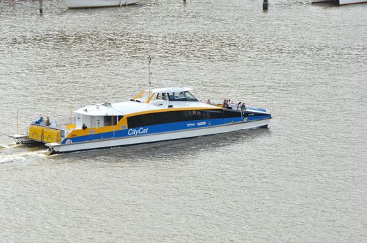 Brisbane City Cat. Catamarans are a popular mode of public transport in Brisbane which is often referred to as the River City.