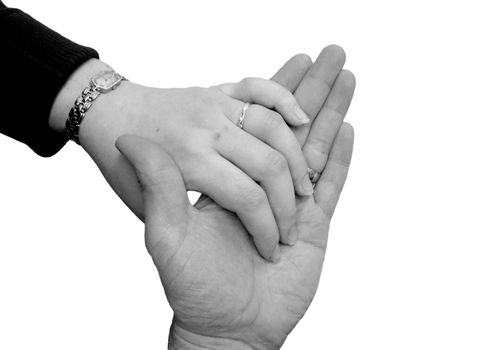Monochrome of Husband and wife holding hands showing wedding rings