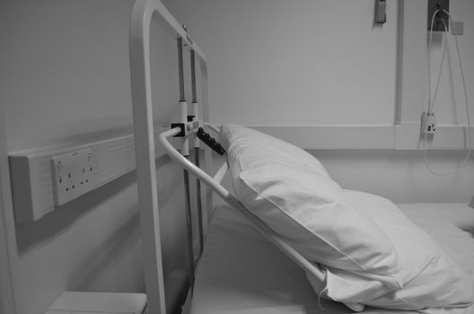 Monochrome of hospital bed with head rest lifting machanism