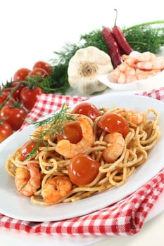 spaghetti with shrimps, tomatoes and dill