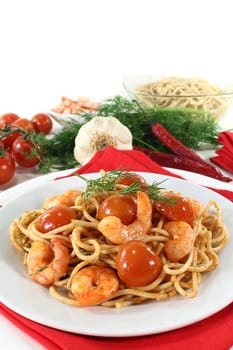 spaghetti with shrimps, tomatoes and dill